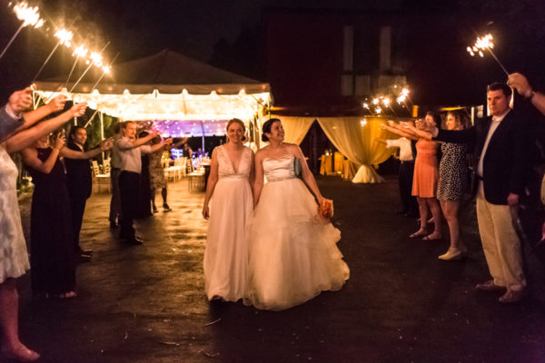 intimate tented Virginia wedding - sparkler exit - two brides - same sex wedding