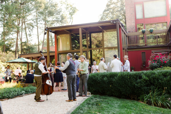 intimate tented Virginia wedding - cocktail reception back patio