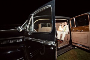 vintage car getaway from an at-home wedding