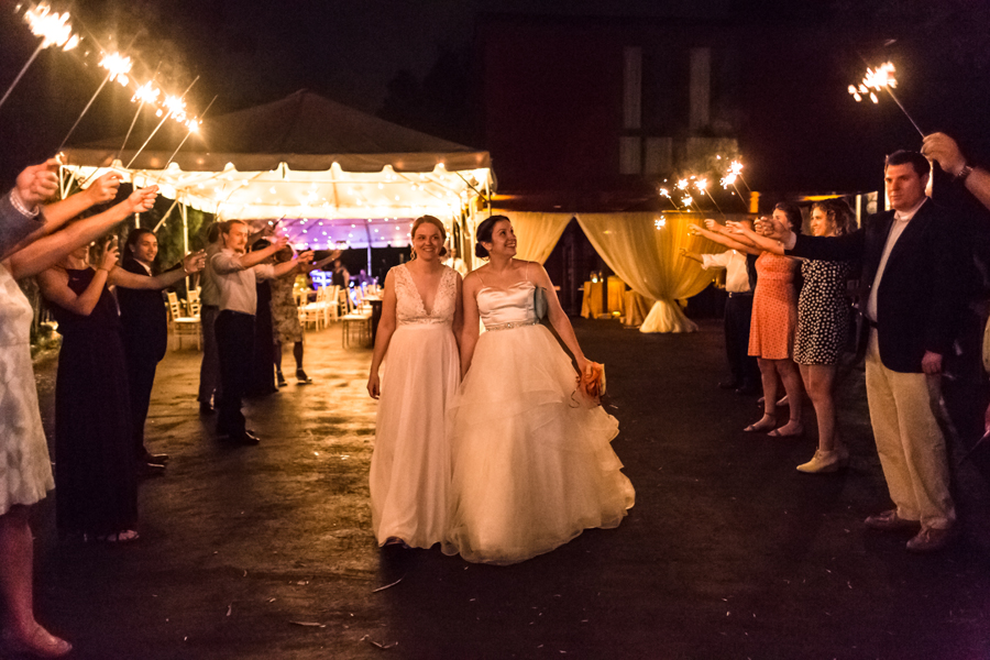 intimate tented Virginia wedding - sparkler exit - two brides - same sex wedding - at home backyard
