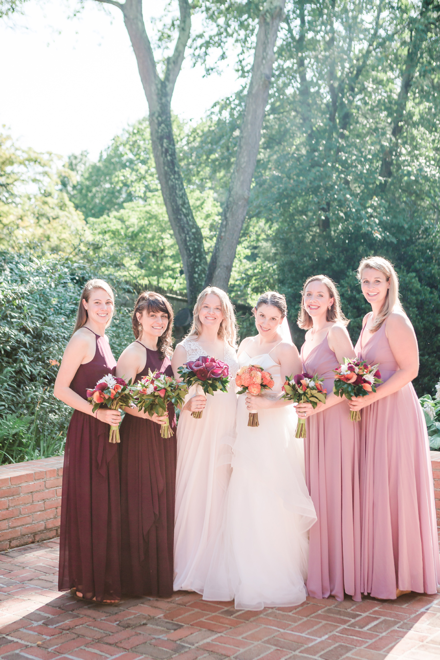 intimate virginia at home wedding - two brides and pink bridesmaid dresses
