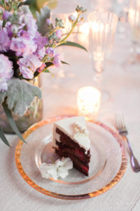 Slice of chocolate wedding cake on a pretty glass plate - Bellwether Events