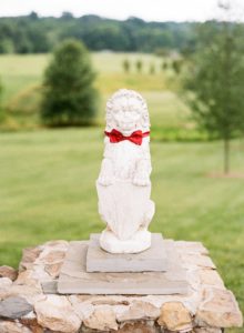 Statue wearing a bow tie at an at-home wedding planned by Bellwether Events
