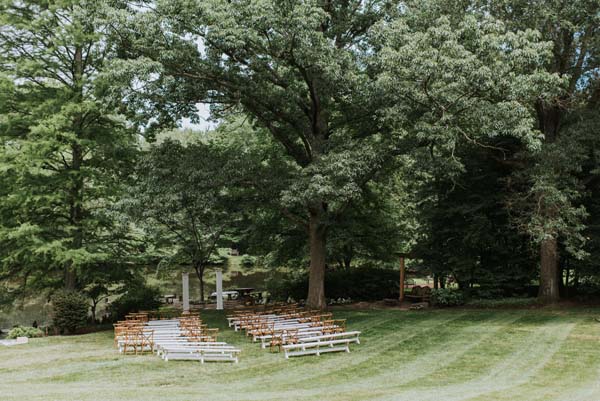 McLean Virginia home wedding ceremony: benches mixed with chairs