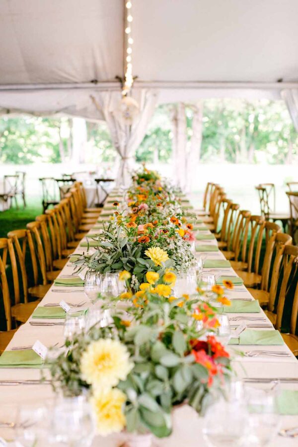 Marlborough Hunt Club Wedding Reception - summer tent wedding - colorful wildflower