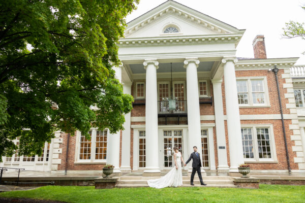 Strathmore Mansion Bethesda MD wedding venue - bride and groom by the columns